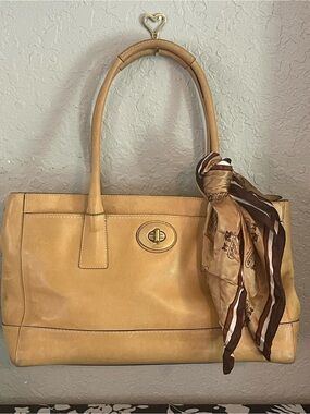 Coach camel colored leather carryall handbag